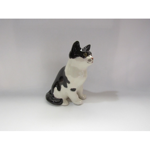 4238 - A Winstanley black and white cat, No. 3, 23cm tall