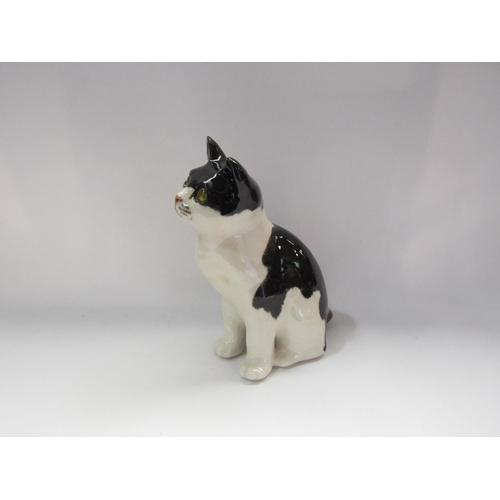 4238 - A Winstanley black and white cat, No. 3, 23cm tall