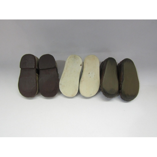 4263 - Two resin pairs of shoes and a pair of blue sandals, 10cm long,  one a/f