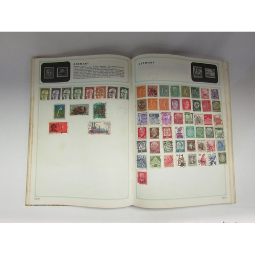 4264 - Three albums containing a quantity of World stamps    (E) £20-30