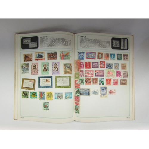 4264 - Three albums containing a quantity of World stamps    (E) £20-30