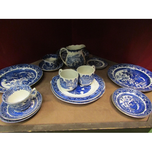 4283 - A selection of blue and white and willow pattern ceramic plates, jugs, cups and saucers