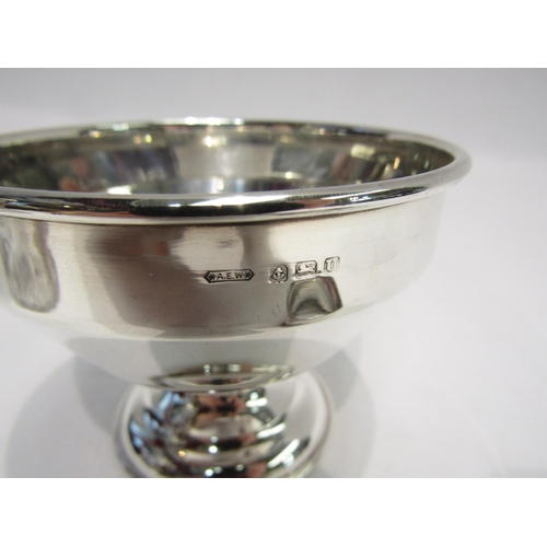 4289 - A silver sugar bowl, Birmingham, a sugar sifter with matched silver lid and a silver napkin ring (3)