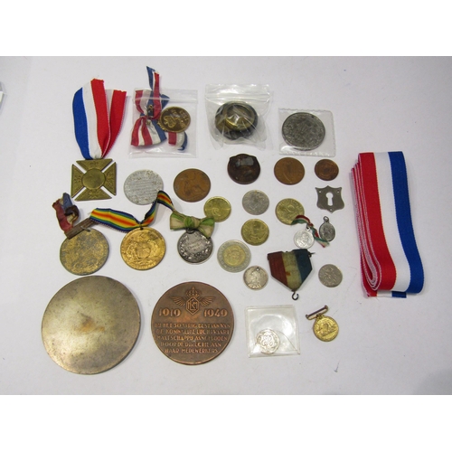 4327 - A tub of mainly war related counters, medals and ribbon including British and German etc