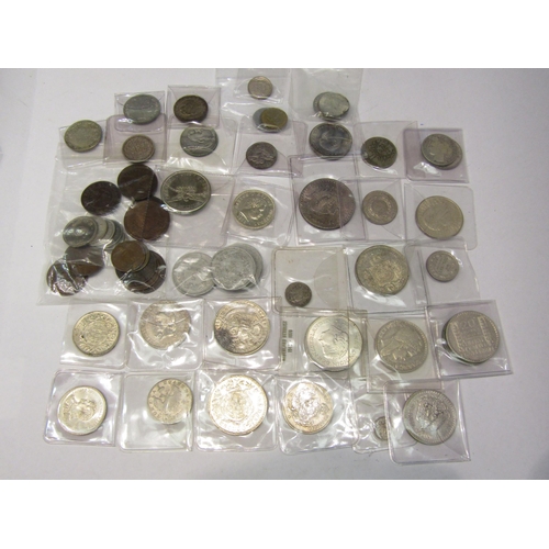 4328 - A collection of Foreign coinage, mainly white metal examples, European, South American etc plus bron... 