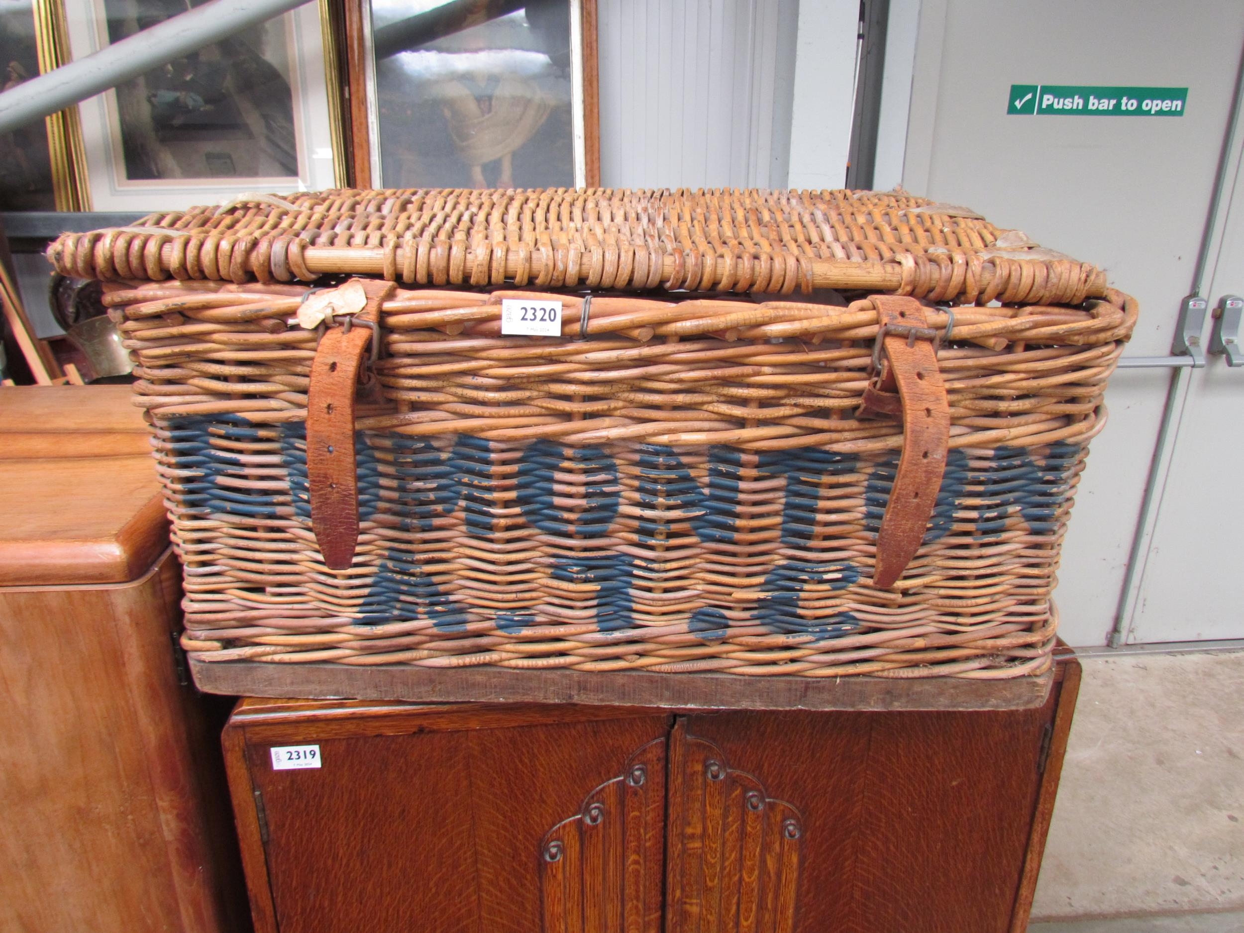 A wicker basket, stamped Edmonton A.T.C