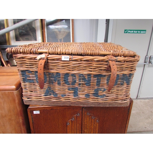 A wicker basket, stamped Edmonton A.T.C