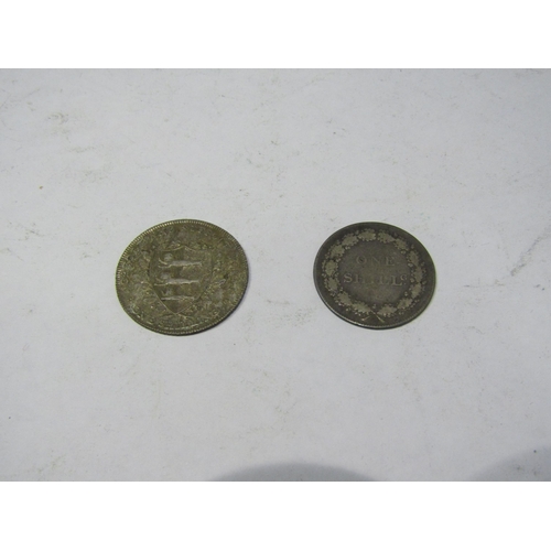 4338 - A Yarmouth silver shilling token of 1811 and a silver shilling of Peels Harding, 1811 (2)