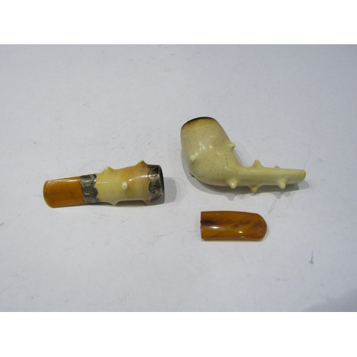 4365 - A cased Meerschaum pipe a/f and a cigarette holder, both with amber mouthpieces (2)