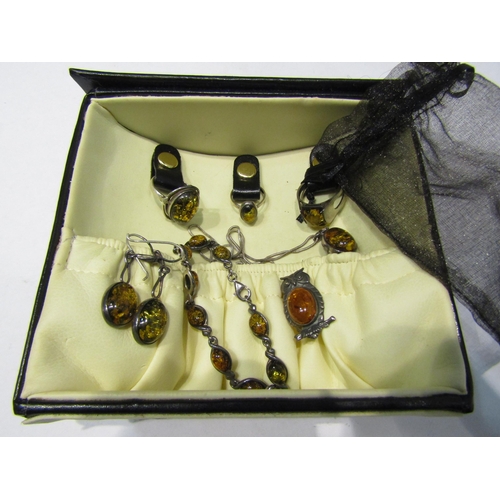 4379 - Three amber rings, bracelets, earrings, double sided pendant hung on chain, stamped 925 and Owl broo... 