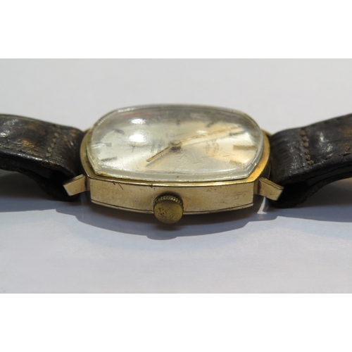 8123 - A 9ct gold Rotary 17 jewel Incabloc manual wind wristwatch with worn leather strap