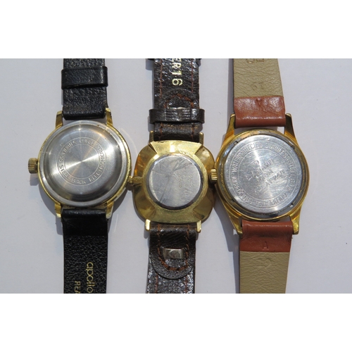 8125 - Three stainless steel backed gents watches Rotary, Ruhla & Majorex