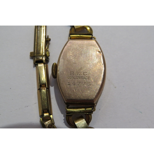 8117 - A British Watch Company 9ct gold cased ladies wristwatch with rolled gold strap and Avia 9ct gold ca... 