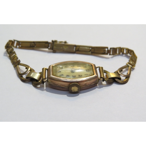 8117 - A British Watch Company 9ct gold cased ladies wristwatch with rolled gold strap and Avia 9ct gold ca... 