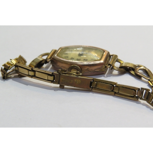 8117 - A British Watch Company 9ct gold cased ladies wristwatch with rolled gold strap and Avia 9ct gold ca... 