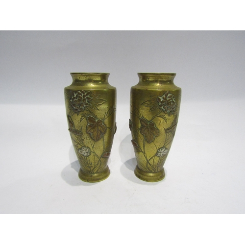 4388 - A pair of brass vases, Chinese influence with bird and flowers in relief, 16cm tall, one a/f, 15cm t... 