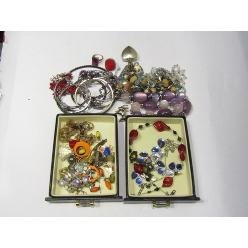 4398 - A case of bijouterie costume earrings, necklaces, rings and bangles