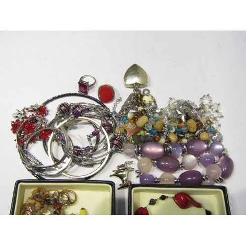 4398 - A case of bijouterie costume earrings, necklaces, rings and bangles