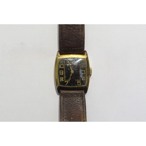 8112 - A vintage Omega 9ct gold cased manual wind wristwatch, second hand missing, strap may need replacing