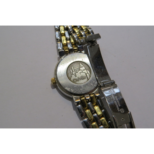 8183 - A ladies Omega De Ville stainless steel and gold plated quartz wristwatch  (E)  £40-60  AI