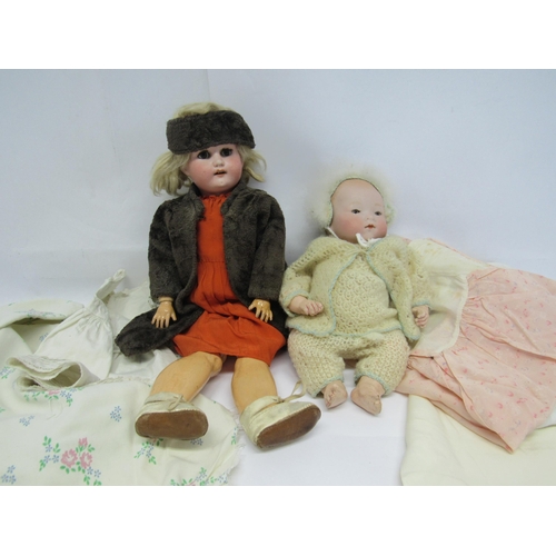 7139 - Two early 20th Cemtury German bisque head dolls with articulated composition bodies, to include Arma... 