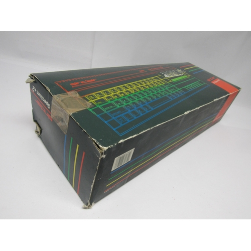 7005 - A boxed Sinclair ZX Spectrum +2 vintage computer gaming console, together with Sinclair SJS-1 joysti... 