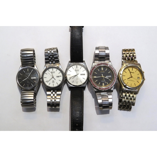 8145 - Five Seiko wristwatches including four Quartz and one automatic SQ x 2, SQ100, SQSports 100