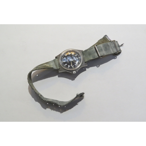 8147 - A Cabot Watch Company (CWC) military Quartz wristwatch, black dial with numerals. Back cover marked ... 