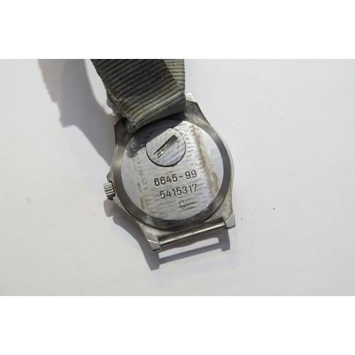 8147 - A Cabot Watch Company (CWC) military Quartz wristwatch, black dial with numerals. Back cover marked ... 