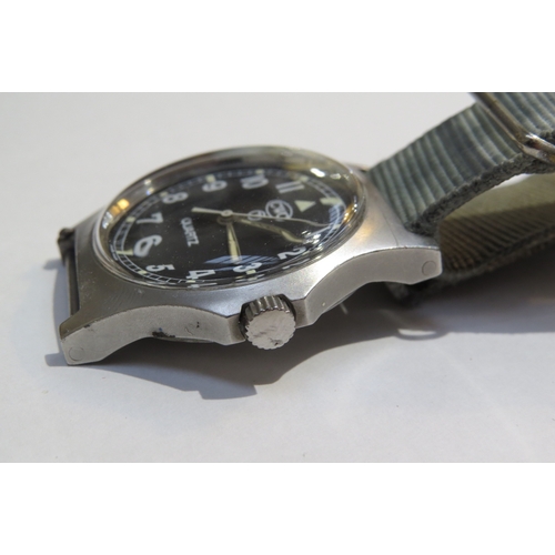 8147 - A Cabot Watch Company (CWC) military Quartz wristwatch, black dial with numerals. Back cover marked ... 