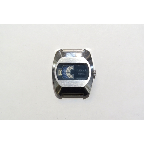 8150 - A Regus digital jump hour wriestwatch no strap