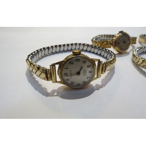 8148 - Five 9ct gold cased ladies wristwatches with flexible straps