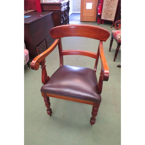 4064 - A Victorian style walnut desk armchair with scroll arms over turned and tapering fore legs  (R)  £25