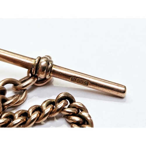 8217 - A 9ct gold watch chain with fob, both marked 9 375. 42.3g