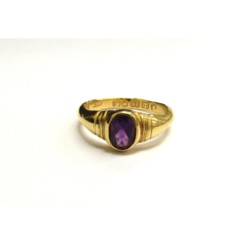 9384 - A Georgian 18ct gold ring with oval amethyst. Size K, 2.5g  (R) £150 (Special)