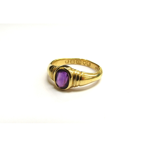 9384 - A Georgian 18ct gold ring with oval amethyst. Size K, 2.5g  (R) £150 (Special)