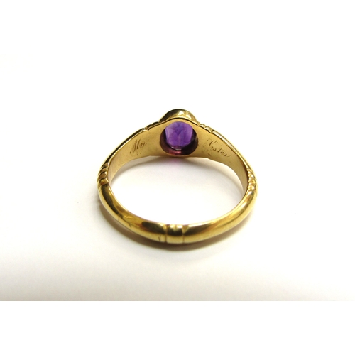 9384 - A Georgian 18ct gold ring with oval amethyst. Size K, 2.5g  (R) £150 (Special)