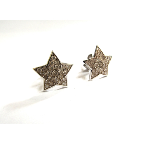 9186 - A pair of white gold star shaped stud earrings set with diamonds, 1.5cm, 4.9g   (C)