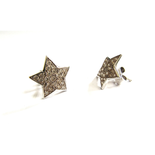 9186 - A pair of white gold star shaped stud earrings set with diamonds, 1.5cm, 4.9g   (C)