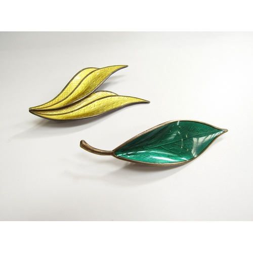 9431 - A David Andersen green enamel leaf brooch and a yellow enamel double leaf brooch stamped Norway Ster... 