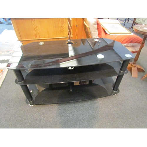 1061 - A modern three-tier rectangular black television unit, 51cm tall x 100cm wide x 44cm deep