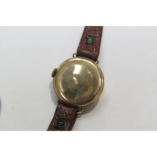 8133 - A 9ct gold cased Perfex ladies wristwatch on leather strap