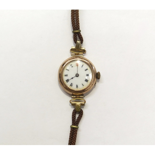 8132 - A 9ct gold cased wristwatch with white enamel dial, on leather strap   (E) £60-80 Jewellery Sale