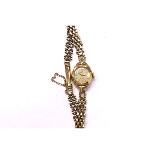 8131 - A 9ct gold Rolex Precision ladies wristwatch on gold strap