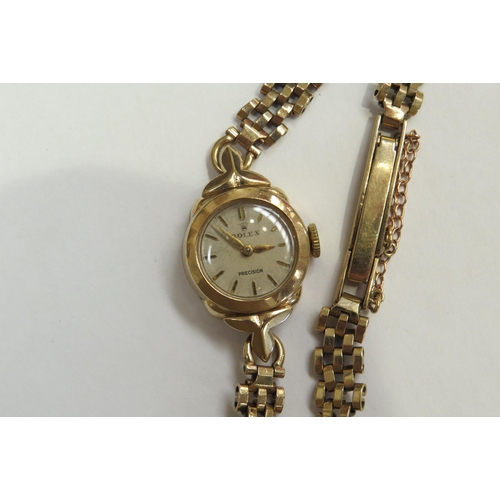 8131 - A 9ct gold Rolex Precision ladies wristwatch on gold strap