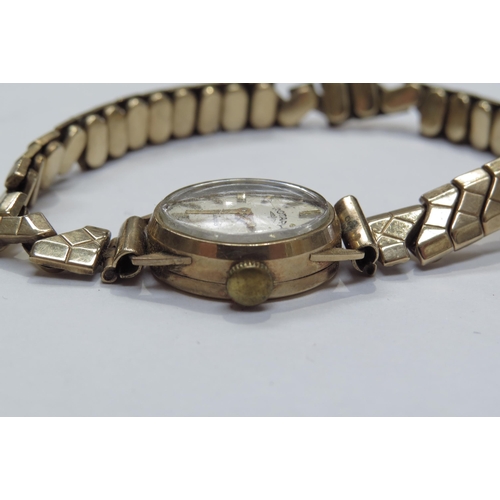 8115 - A 9ct gold cased ladies Rotary wristwatch, stamp to strap