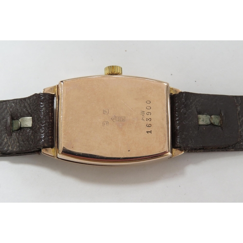 8167 - A 9ct gold cased Rolex on leather strap