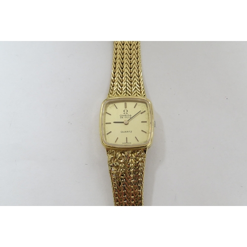 8187 - An Omega De Ville quartz 18ct gold ladies wristwatch (repair to strap)  (C)