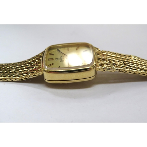 8187 - An Omega De Ville quartz 18ct gold ladies wristwatch (repair to strap)  (C)