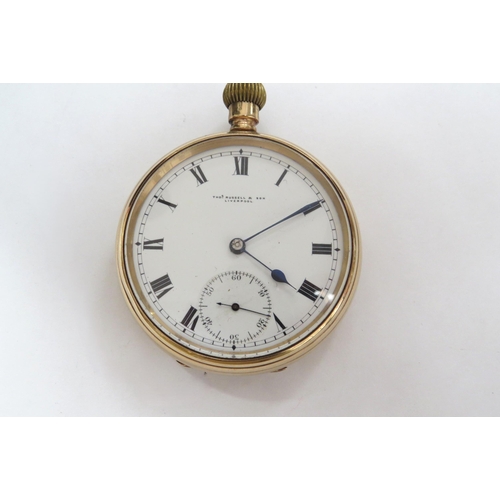 8211 - A gold cased Thos. Russell & Sons, Liverpool pocket watch, case stamped 375, with a yellow metal cha... 